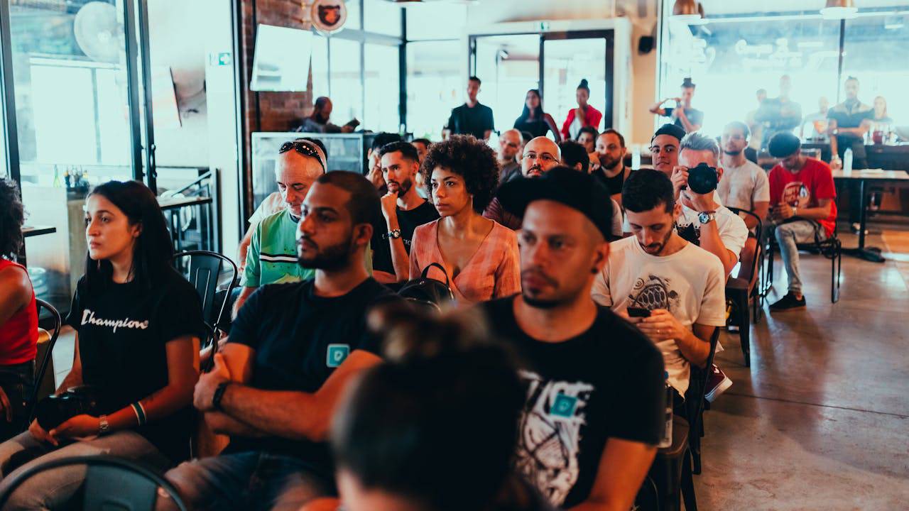 image of a group of people sitting in an event